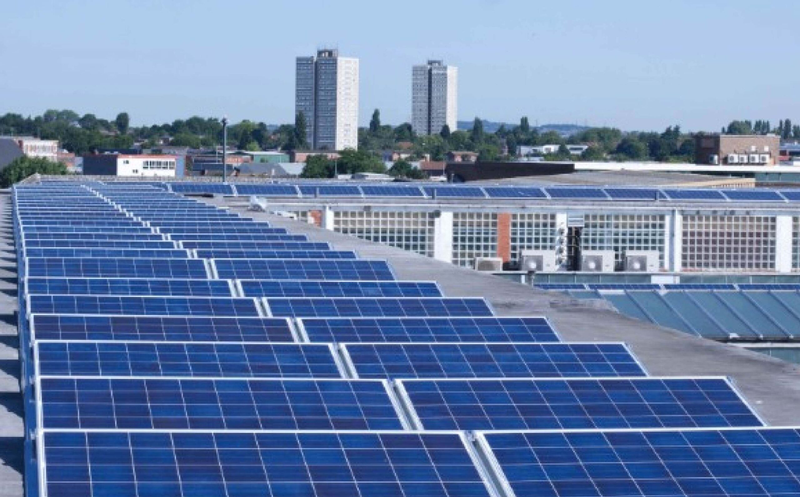 School rooftop with installed solar panels in Gujarat